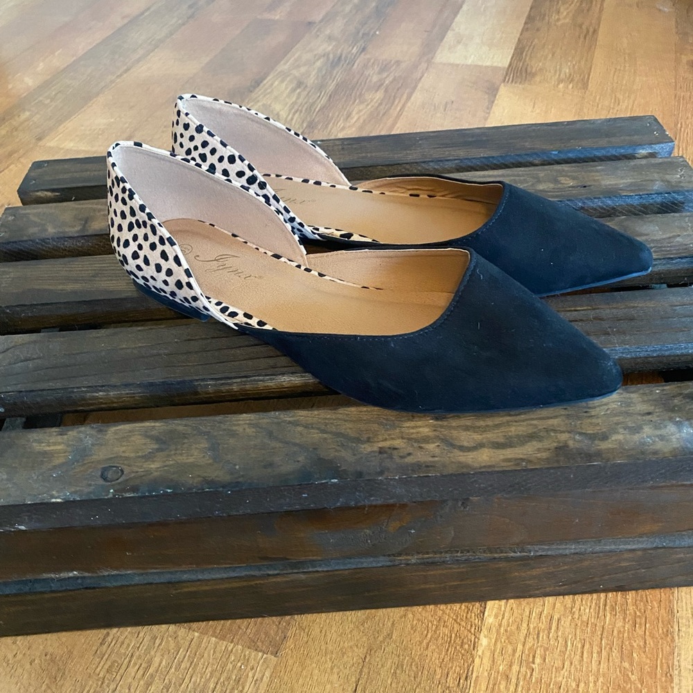 Lynx Black and Tan spotted Flats. Never worn. Size 8.5